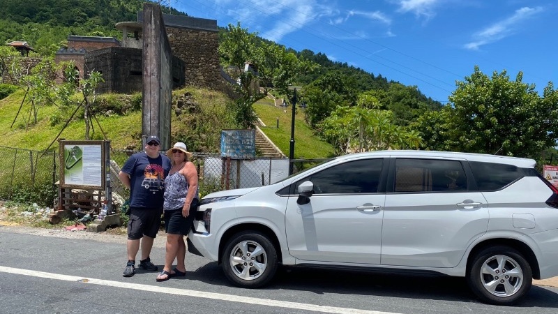 Private car transfer from Hoi An to Phong Nha with scenic stops at Marble Mountains, Hai Van Pass, and Central Vietnam landscapes.