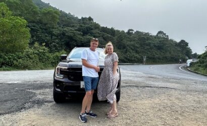 Private car transfer from Phong Nha to Da Nang with scenic stops at Hai Van Pass, Lang Co Beach, and Marble Mountains.