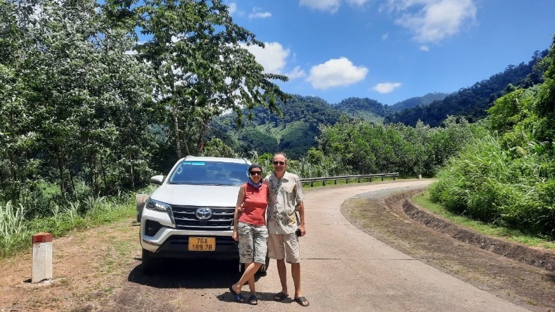 Private car transfer from Phong Nha to Hue with scenic stops at La Vang Holy Land and Hien Luong Bridge in Central Vietnam.
