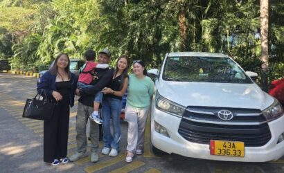 Airport pickup service in Phong Nha with a private driver welcoming travelers for a comfortable transfer from Dong Hoi Airport.
